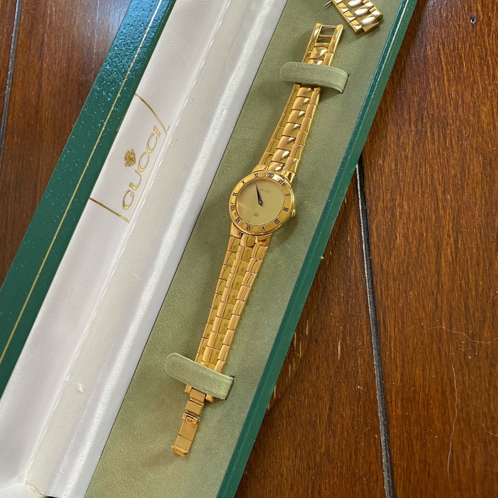 Gold Gucci Watch
